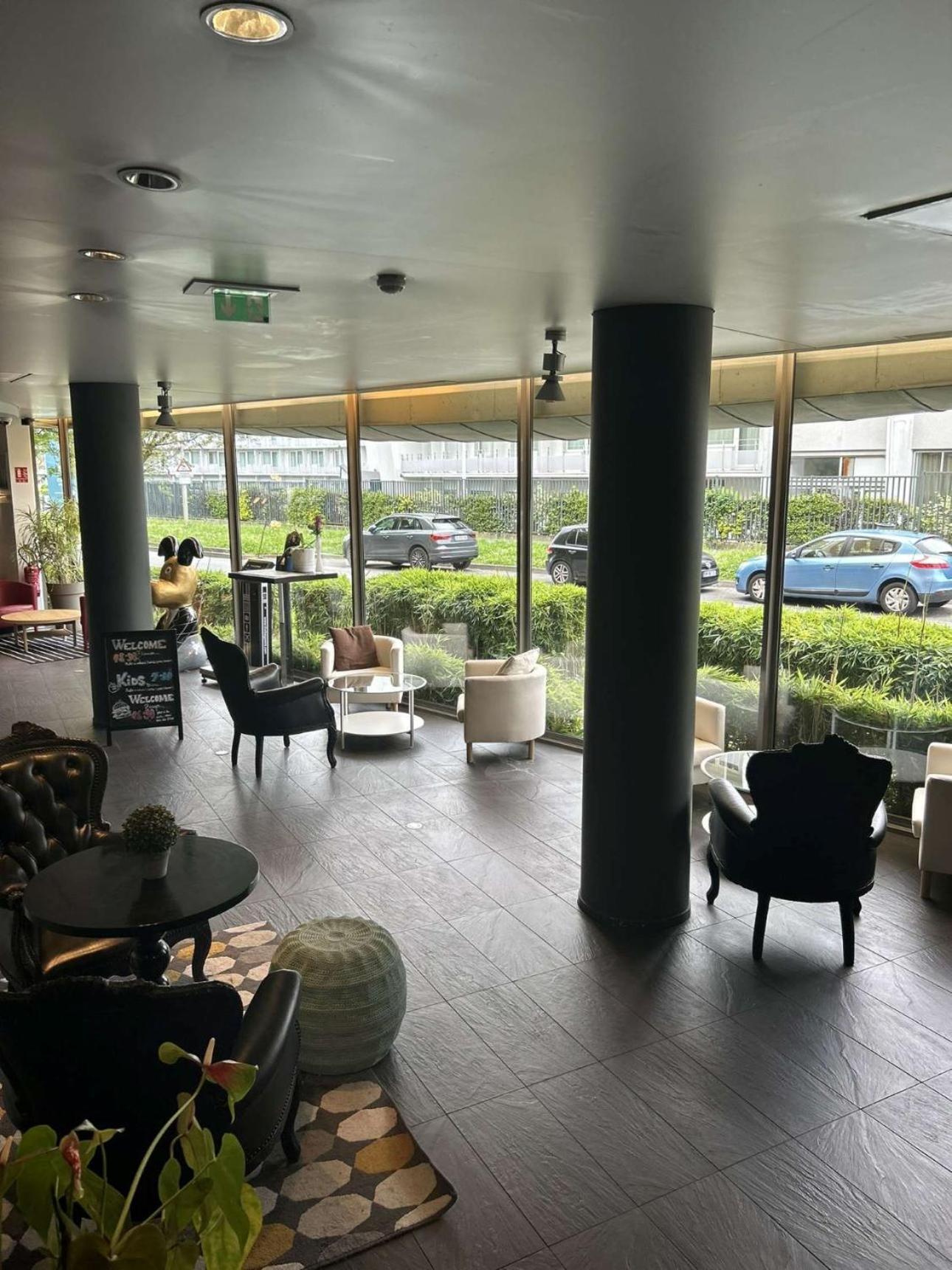 רואיסי-אן-פרנס Standing Hotel Suites By Actisource מראה חיצוני תמונה